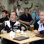 Russia's President Medvedev and Prime Minister Putin watch the international friendly soccer match between Argentina and Russia in Sochi